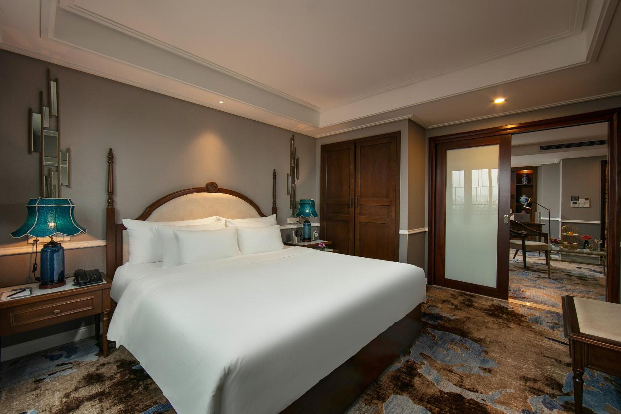 فندق ذا أورينتال جايد هانوي المظهر الخارجي الصورة A bedroom at the hotel